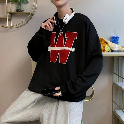 Modischer Pullover mit lockerer Passform und eleganten Buchstaben.