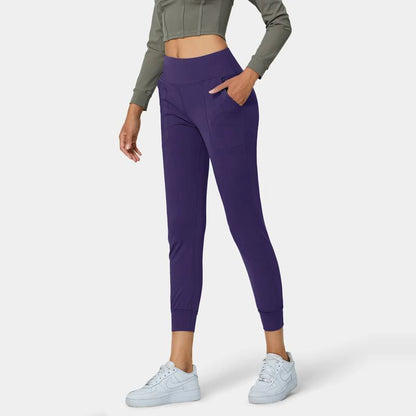 Pantalones deportivos ajustados con bolsillos para fitness, yoga y running al aire libre.
