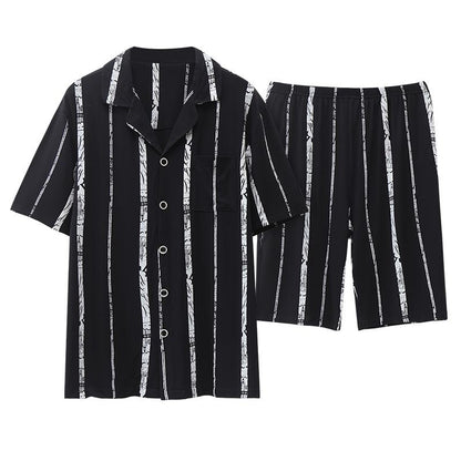 Gestreiftes Modal-Schlafanzugset mit Knopfleiste in Schwarz und Weiß mit Lycra-Kragen.