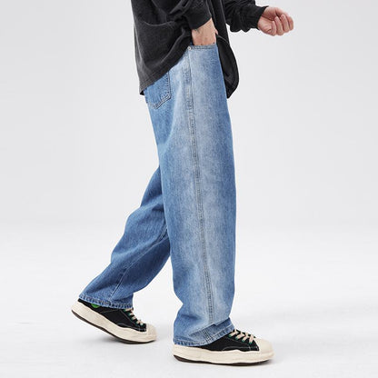 جينز بأرجل واسعة بنمط طباعة مستقيمة وطابع عرضي عادي.
