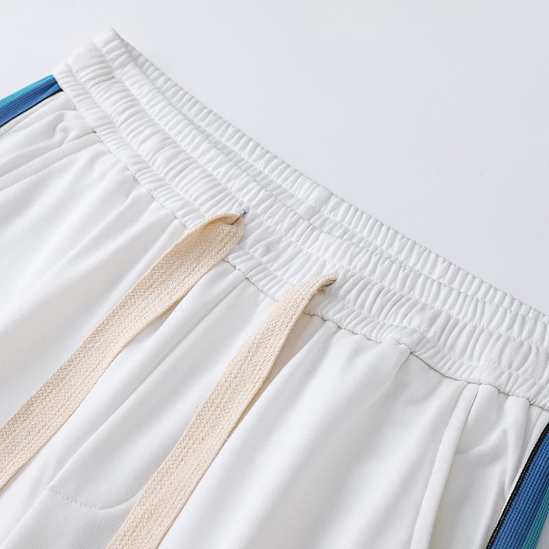 Pantalón deportivo versátil recto de moda con cintura elástica y ajuste holgado.