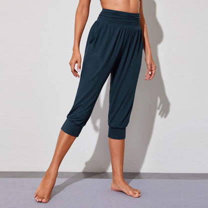 Pantalon de sport ample et multicolore à taille haute avec poches pour le yoga et la course à pied.
