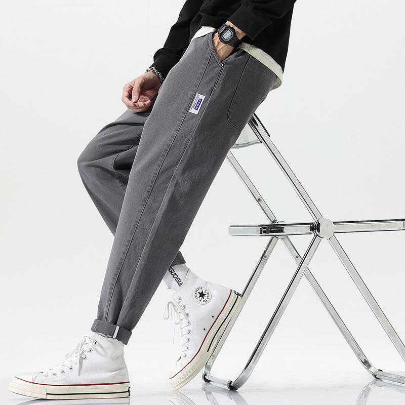 Pantalones deportivos casuales de ajuste holgado y corte cónico reforzados