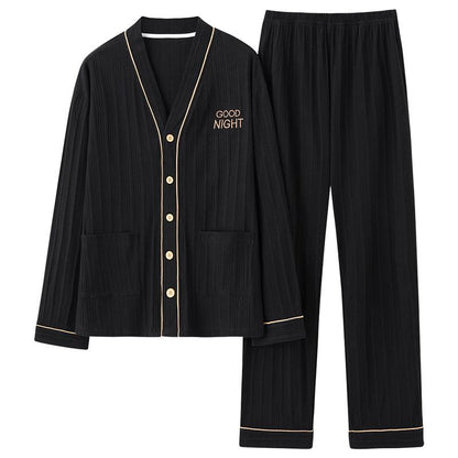 Conjunto de pijama simple de algodón puro de doble cara tejido ajustado con botones frontales y cordón.