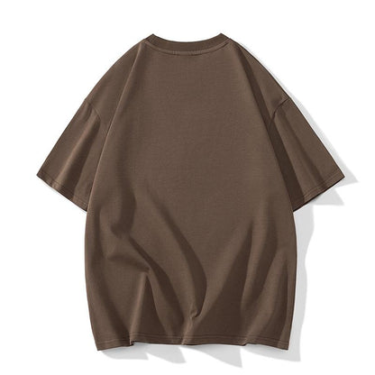 Tee-shirt à manches courtes en coton pur, ample avec épaules tombantes, polyvalent.