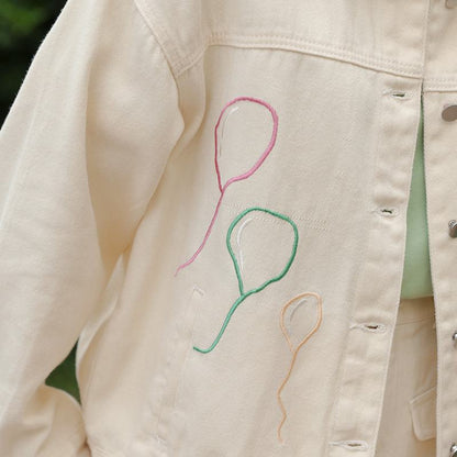 ヴェルサタイルなレトロラペルカラー刺繍ルーズフィットデニムジャケット。
