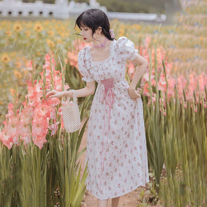 Vestido de cintura ajustada estilo palaciego elegante con estampado floral y lazos delicados de primer amor de hadas.