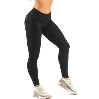 Leggings deportivos elásticos ajustados para yoga y fitness.