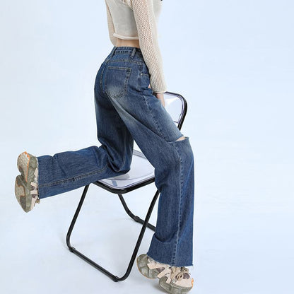 Jean taille haute, droit, style streetwear polyvalent, ample et délavé.