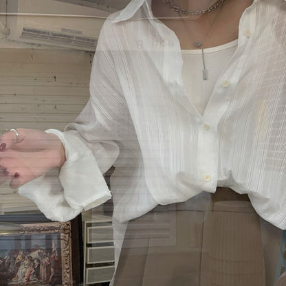 Camisa delgada y transpirable con protección solar ligeramente transparente