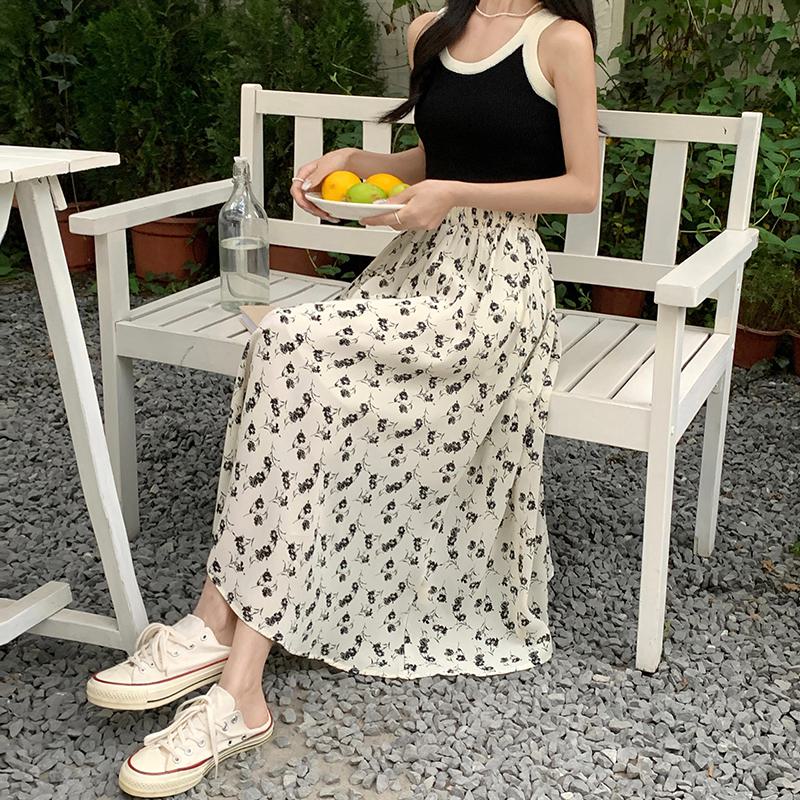 Falda de malla versátil con estampado floral y cintura elástica midi