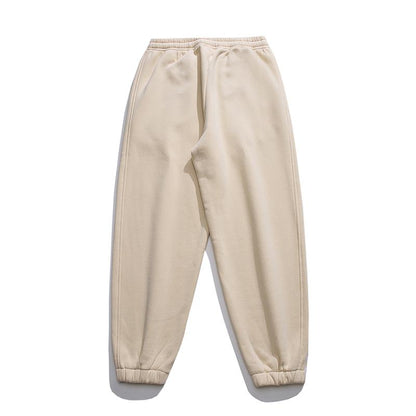 Pantalon de survêtement polyvalent à taille élastique et jambe fuselée