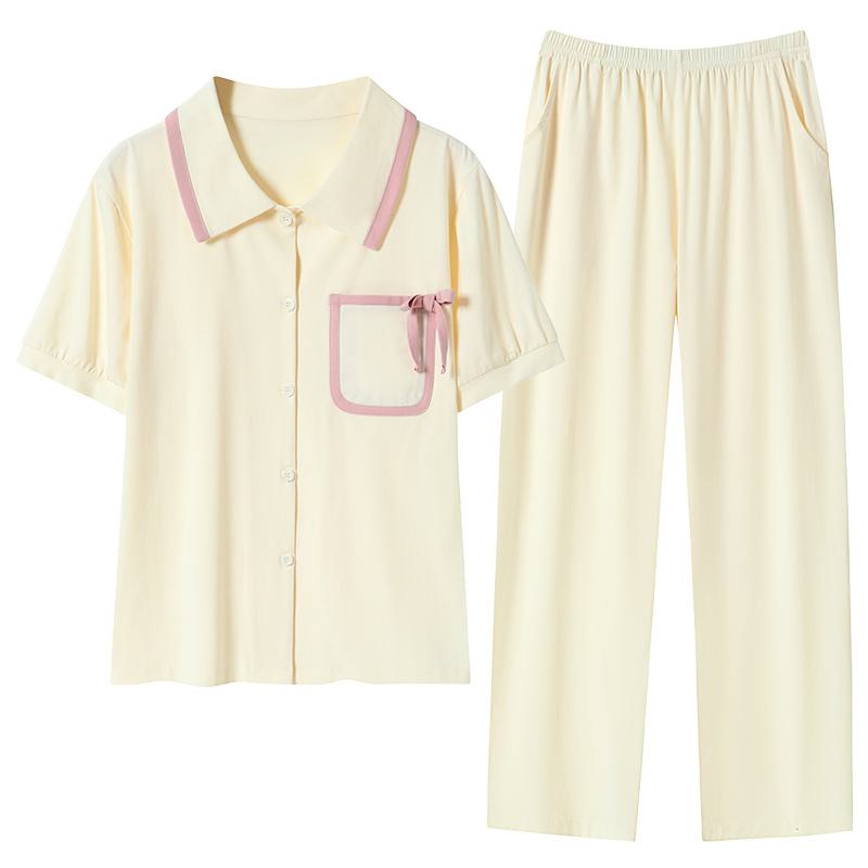 Conjunto de pijama de algodón puro con cuello de lycra y botones en el frente y bolsillo.