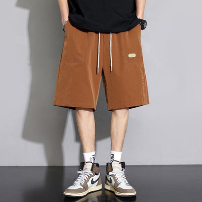 Pantalones cortos de cintura ajustable, sueltos y versátiles con cordón de moda