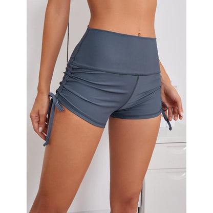 Shorts deportivos de piel de durazno de cintura alta ajustados con lazo para yoga, correr y fitness.