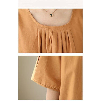 فستان ليني بقَصَّة ألين، بسيط ومتساهل، بتصميم صلب.
