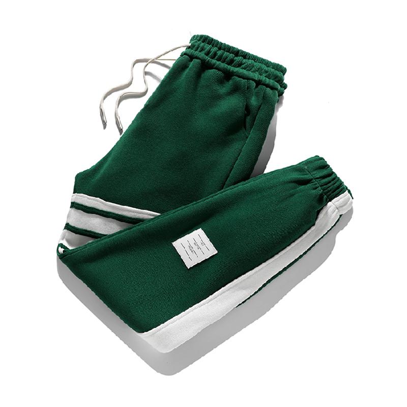 Pantalón de algodón puro y elástico, cintura elástica ajustable, corte holgado y versátil.