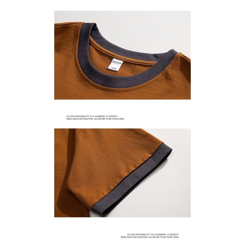 Cómoda y suave camiseta de algodón de manga corta con cuello redondo y apariencia de dos piezas.