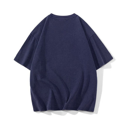 Camiseta de manga corta casual de algodón puro con caída de hombros y ajuste holgado.