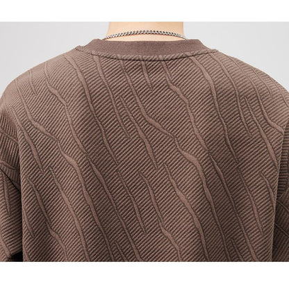 Bequemer Rundhalsausschnitt Pullover aus reiner Baumwolle in Dunkelblau, lockerer Schnitt.