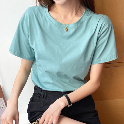 Camiseta de manga corta de cuello redondo y hombros regulares, holgada y versátil.
