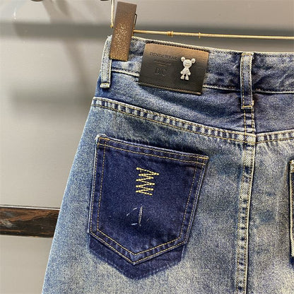 تنورة جينز بقَصَّة محدَّدة للجسم وخصر مرتفع وجيوب بتصميم كلاسيكي متعدد الألوان