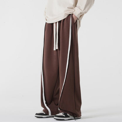 Pantalón de chándal con cordón ajustable y corte cónico tejido