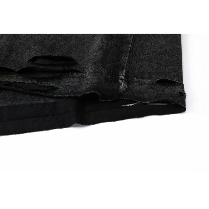 قميص أسود من القطن الخالص بدون أكمام وقصة فضفاضة ذات غسلة عتيقة.