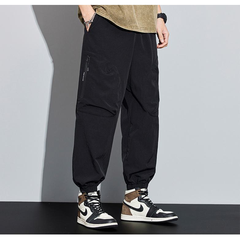 Pantalones cargo sólidos con bolsillos con cremallera cónica