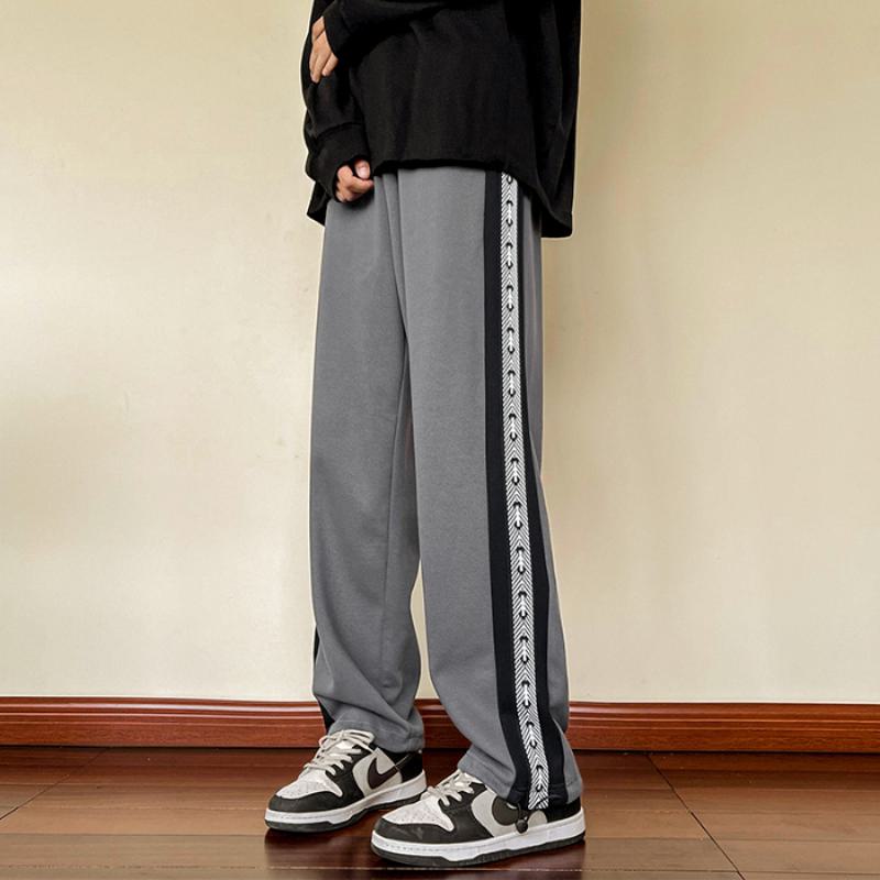 Pantalón deportivo de punto a la moda con corte suelto y cordón ajustable
