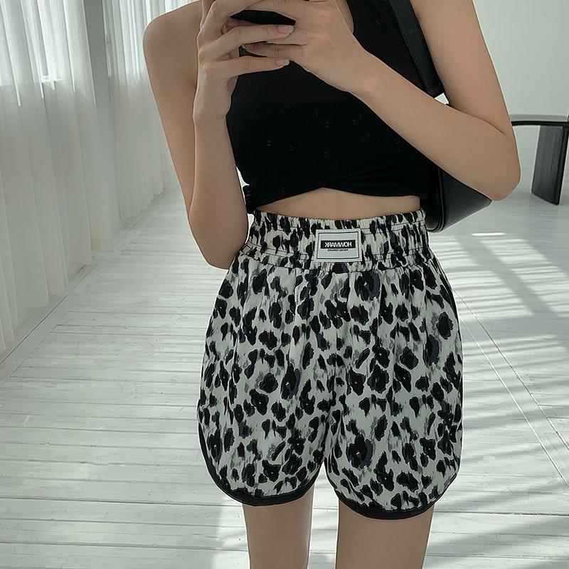 Shorts amples à imprimé léopard fin, taille haute, parfaits pour le sport.