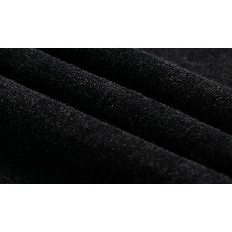 Débardeur noir en coton pur, coupe ample et sans manches, avec un lavage vintage.