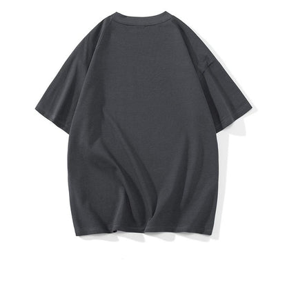 Tee-shirt à manches courtes en coton pur, col rond, coupe ample et épaules tombantes, simplicité tendance.