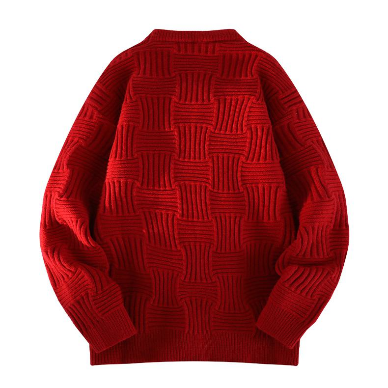 Suéter de punto con cuello redondo, estilo casual y corte holgado.