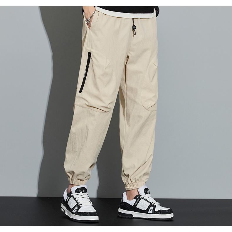 Pantalones cargo sólidos con bolsillos con cremallera cónica