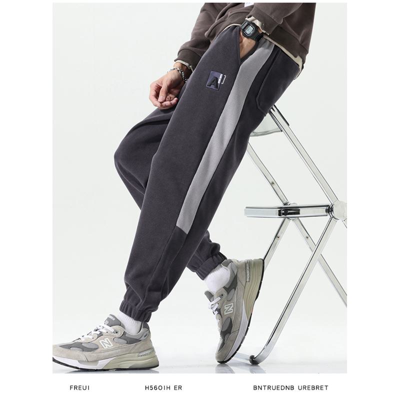 Pantalon de survêtement élastique à taille élastique, coupe ample et fuselée, épais et polyvalent en matière d'élasticité.