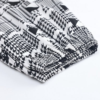 Conjunto de salón de manga corta de cuello redondo de algodón puro tejido ajustado en negro con pantalones y tops