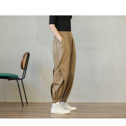 Schmal zulaufende Hose mit elastischem Bund, lockerer Schnitt, reine Baumwolle, Laternenform und Kordelzug