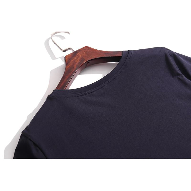 Camiseta de manga corta holgada con cuello redondo y bordado