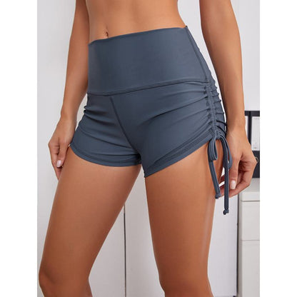 Shorts deportivos de piel de durazno de cintura alta ajustados con lazo para yoga, correr y fitness.