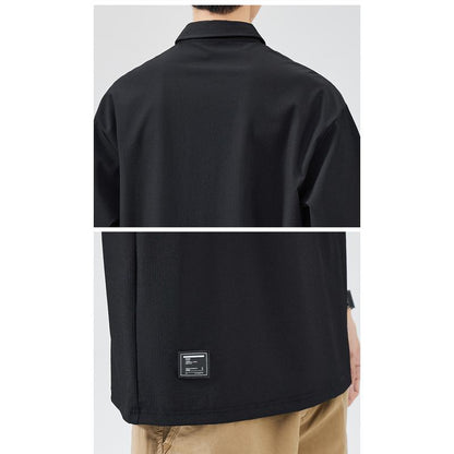 Vielseitiges Kurzarm-Poloshirt aus reiner Baumwolle mit V-Ausschnitt und lässigem, schlichtem Design.