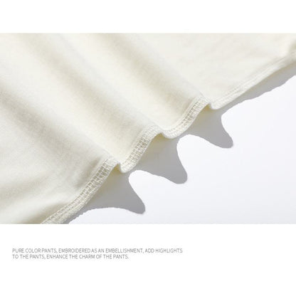 Tee-shirt à manches courtes et épaules tombantes en coton pur, polyvalent et confortable