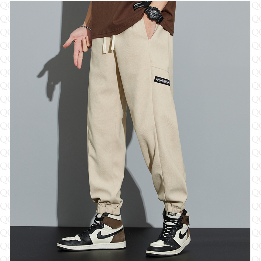 Pantalon en velours côtelé à la mode street style, taille à cordon et coupe ample fuselée
