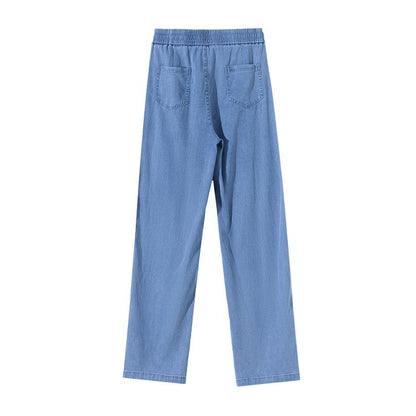 Schmal geschnittene, hoch sitzende Jeans mit geradem Bein, Taillenbetonung und drapiertem Bund mit Tunnelzug.
