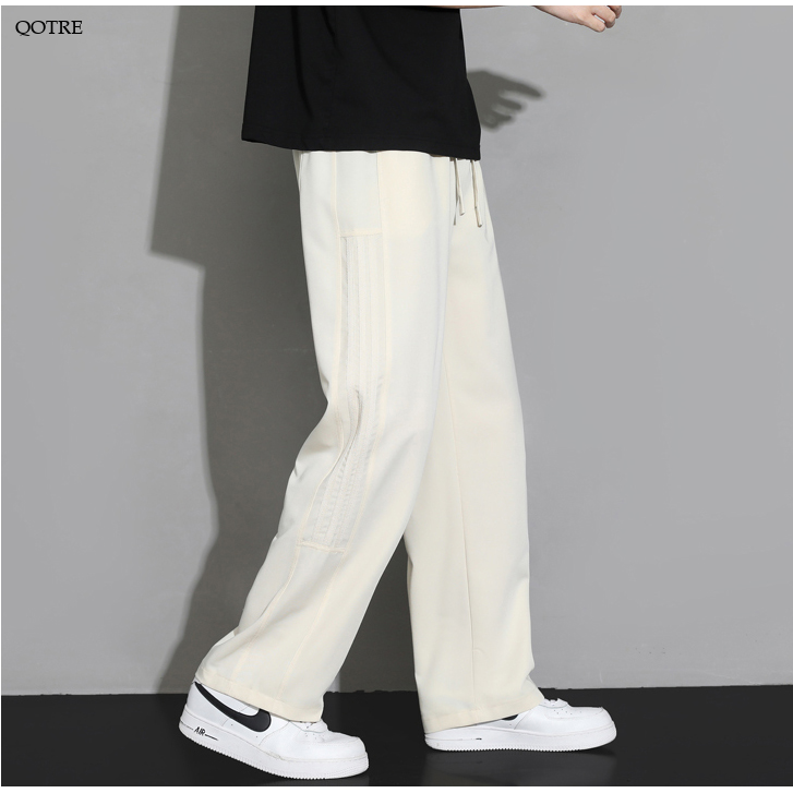 Pantalon de survêtement ample à coupe droite classique qui affine la silhouette