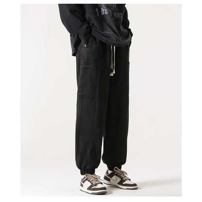 Pantalon polyvalent en simili daim avec cordon de serrage fuselé
