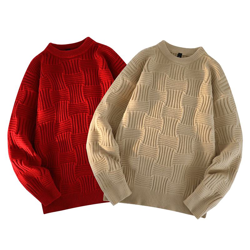 Pull tricoté décontracté à col rond et coupe ample.
