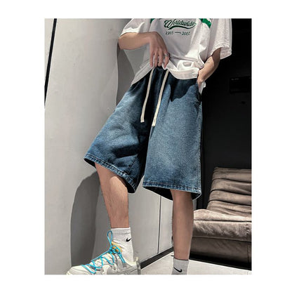 Pantalones cortos de mezclilla lavados, sueltos, de cintura elástica y con cordón ajustable - Versátil y a la moda.