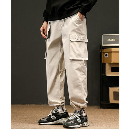 Pantalon cargo ample et fin à coupe fuselée décontractée, style urbain.