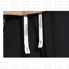 Pantalon de sport en tricot droit, ample et élastique avec des patchworks.